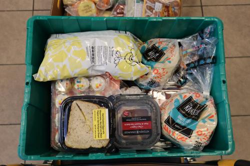 A crate full of rescued food from Kwik Trip