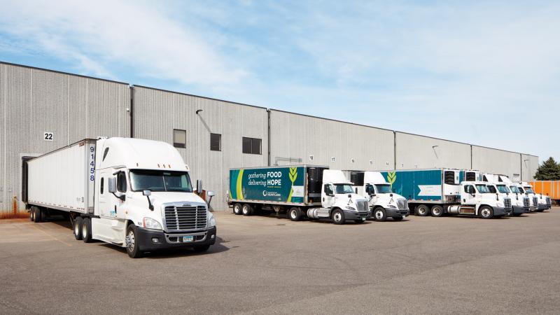 Second Harvest Heartland trucks line up outside loading docks - Credit Corey Gaffer