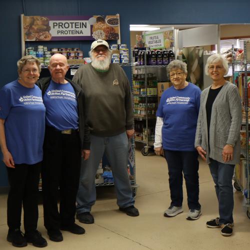 Volunteers at a food shelf