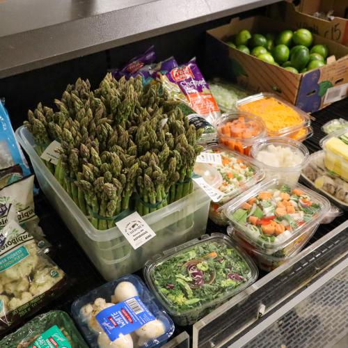 A cooler full of fresh vegetables