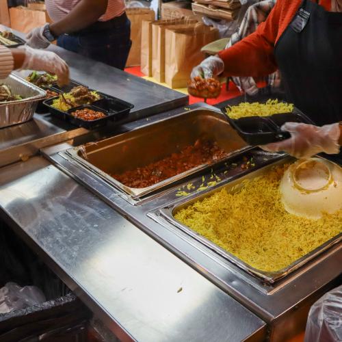 Workers plate Kitchen Coalition meals