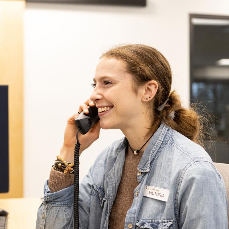 Second Harvest Heartland employee speaks on the phone