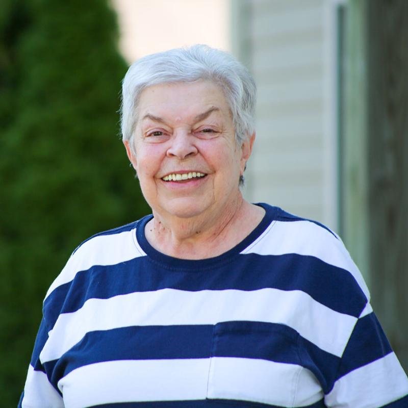 Suzann standing outdoors