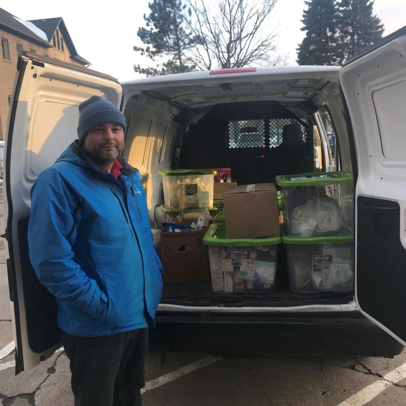 Big Lake Community Food Shelf volunteer prepares for a delivery