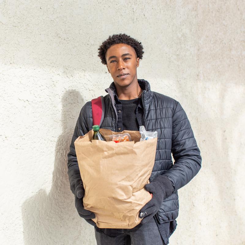 Man standing with groceries