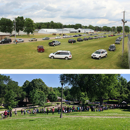 cars and people lined up for food distributions