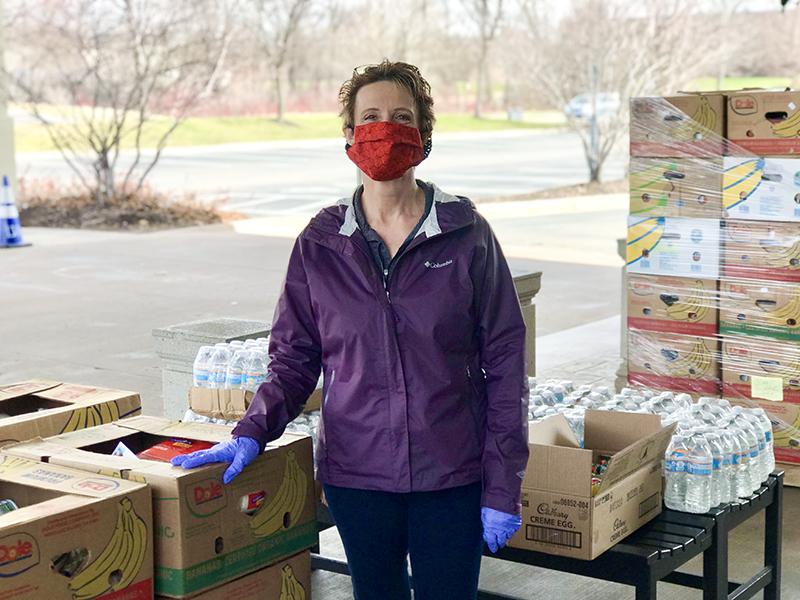 Volunteer Wearing a Mask Volunteer Wearing a Mask