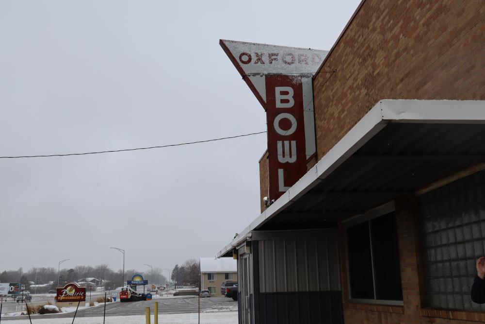 A bowling alley sign