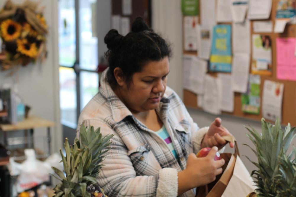 Yannelly, local mother and shopper at Westonka Food Shelf in Mound, Minnesota