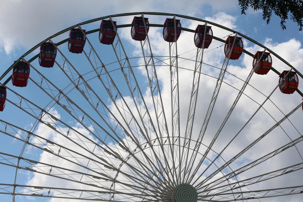 A closeup photo of a ferris wheel