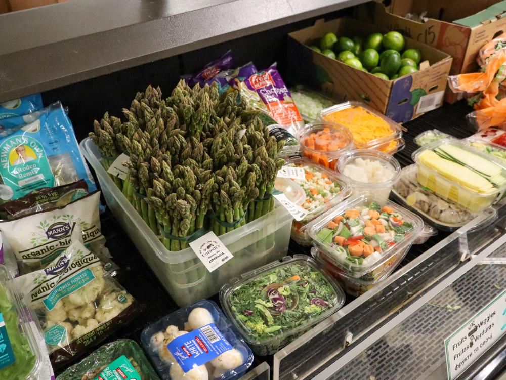 A cooler full of fresh vegetables