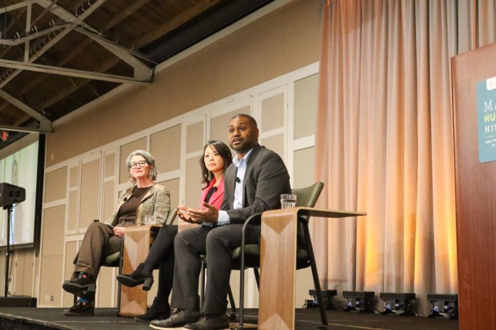 Panelists answer questions at a summit breakout session