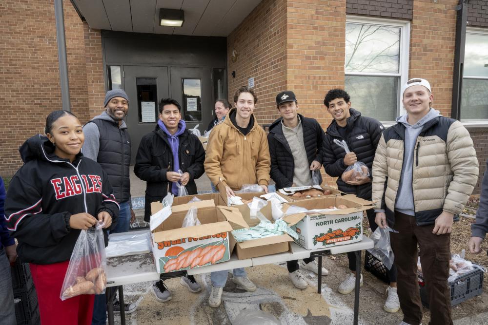 Students helping at a food distribution site