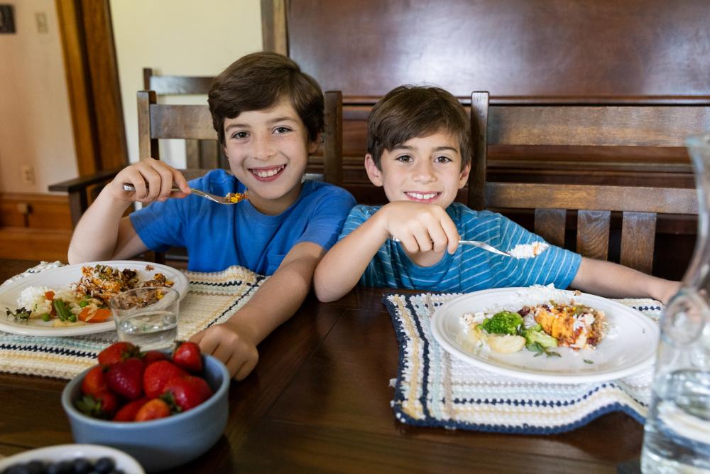 Two Children sitting at table