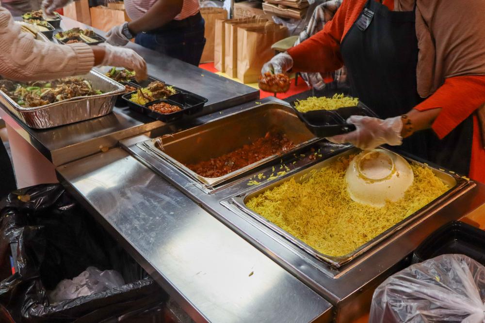 Workers plate Kitchen Coalition meals