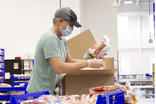 Man packing bread Man packing bread