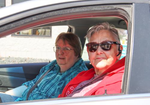 Two seniors in a car