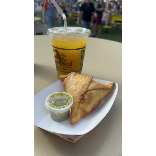 Sambusa and fresh mango juice from Afro Deli in the food building