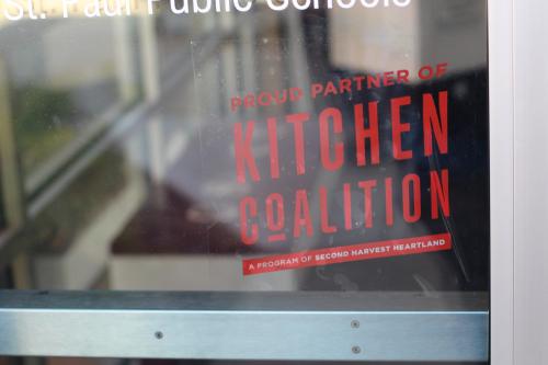 A Kitchen Coalition sticker in a window
