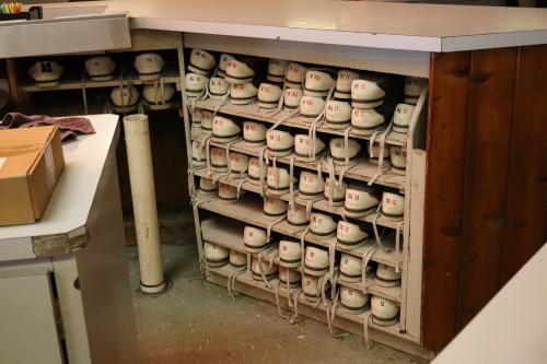Shelves full of bowling shoes