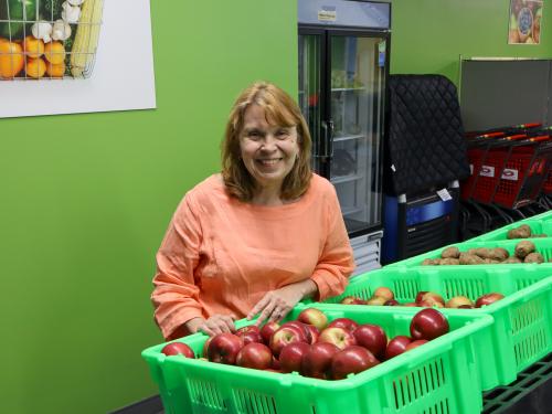 St. Peter Area Food Shelf Manager Cindy Favre St. Peter Area Food Shelf Manager Cindy Favre in produce section of food shelf.