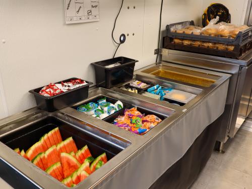 Inside of Osseo Area School's Food Truck Inside of food truck showing trays of hot and cold food