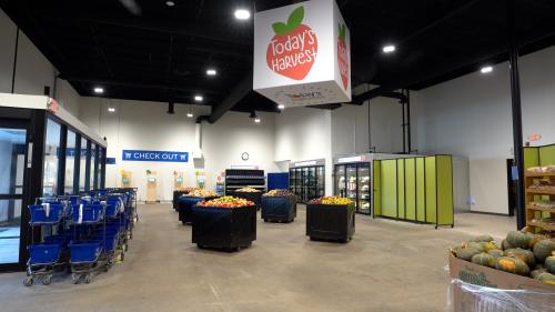 Large, open food market space in a warehouse